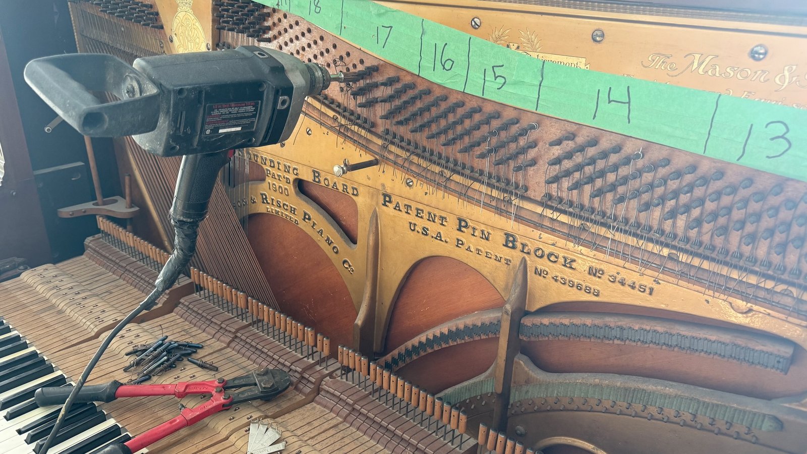 Piano repair and string replacement