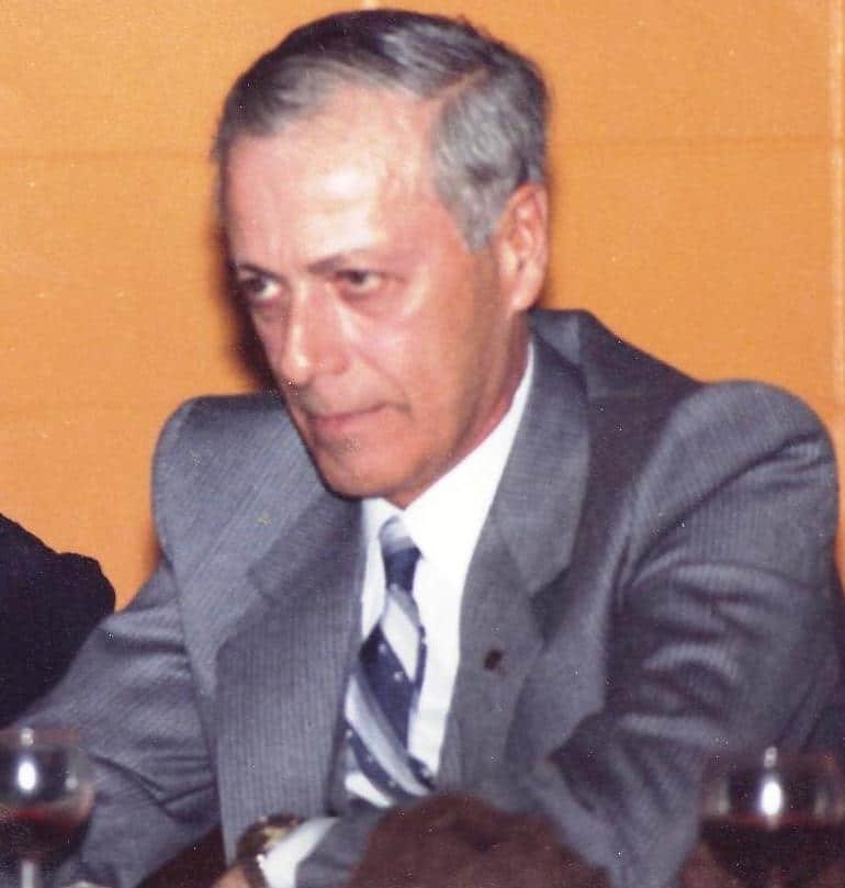 Henri Coulombe working on a piano mechanism